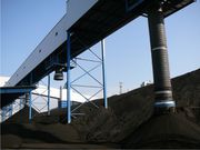 Loading spout for open pile loading