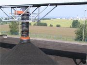 Loading spout for open pile loading